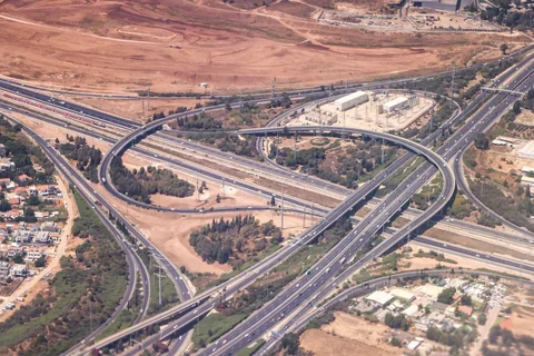 Illustrative aerial photograph of a highway interchange and connecting roads