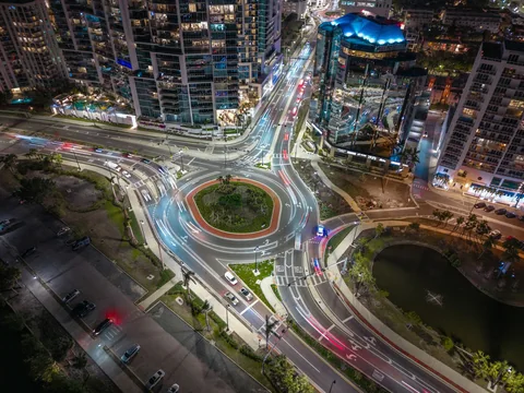 Illustrative aerial photograph of a Sarasota roundabout and connected city streets at night
